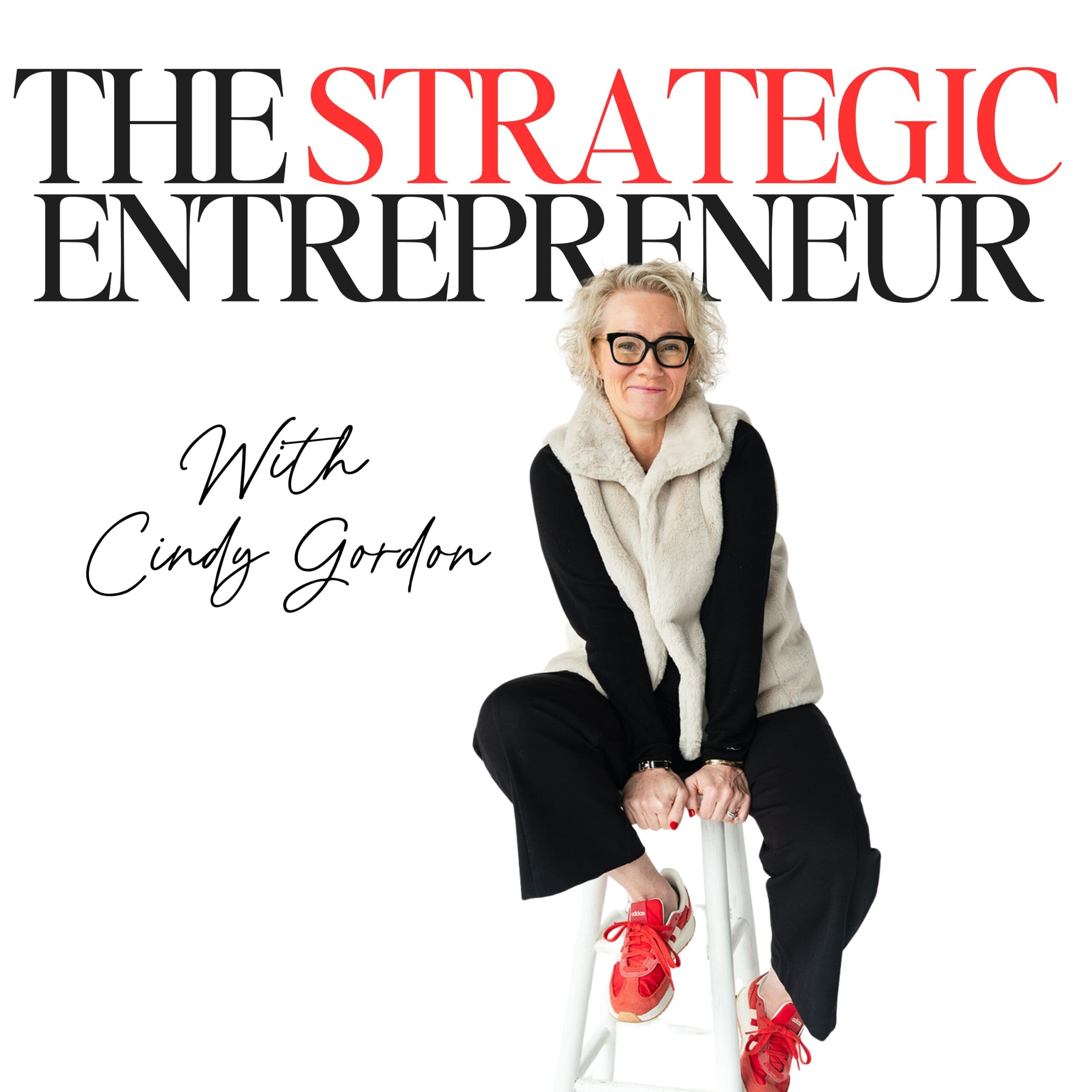 Cindy gordon sitting on a white stool smiling and the words The strategic entrepreneur are a text overlay
